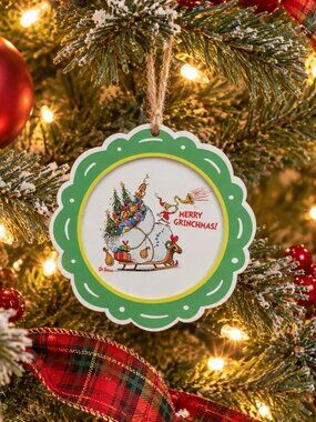 Dr. Seuss The Grinch "Merry Grinchmas" scalloped round wooden hanging wall decor